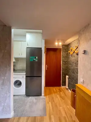 Una cocina o zona de cocina en Acogedor Apartamento de 2 dormitorios con plaza de garaje