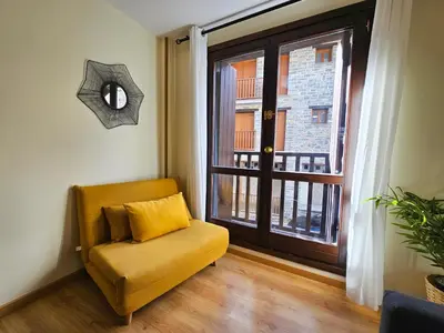 Zona de estar de Apartamentos Escarrilla Suites 3000