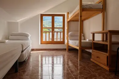 Cama o camas de una habitación en Albergue Tritón - Villanúa