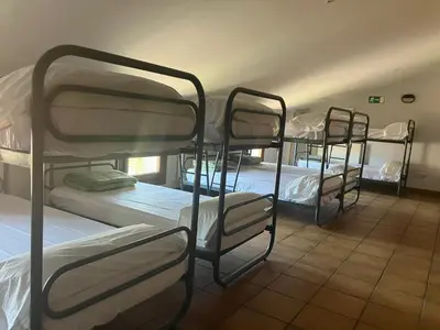 Cama o camas de una habitación en Posada de Ollo
