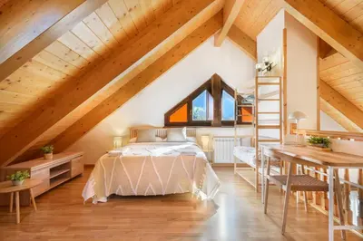 Cama o camas de una habitación en Apartamento A10 de Formigal, AMPLIO Y CON GARAJE