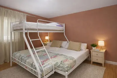 Cama o camas de una habitación en El Príncipe 2