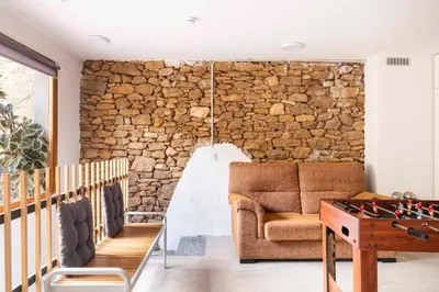 Zona de estar de Casa acollidora i familiar amb barbacoa