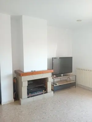 Una televisión o centro de entretenimiento en Cal Robert