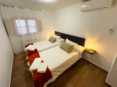 Cama o camas de una habitación en Casa Rural Claudia