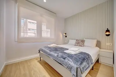 Cama o camas de una habitación en Apartamentos Ezkaba by Clabao