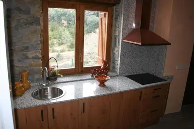 Una cocina o zona de cocina en Casa Rural Urbe