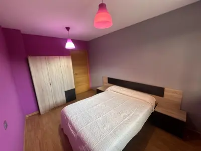 Cama o camas de una habitación en Disfruta del pirineo oscense