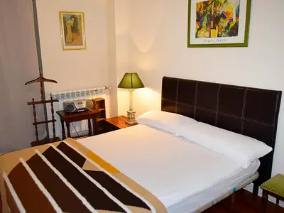 Cama o camas de una habitación en Apartamentos Las Margas Sabiñánigo 3000