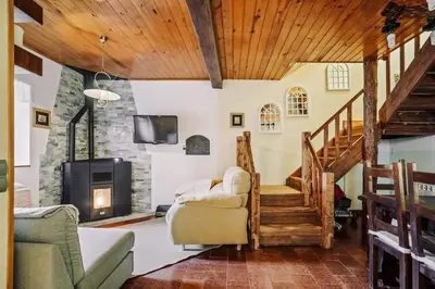 Zona de estar de Casa Rural Arix by Cardi Suites