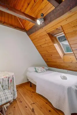 Cama o camas de una habitación en Casa Rural Arix by Cardi Suites