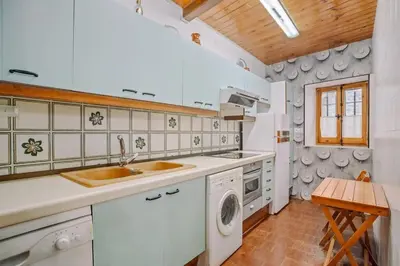 Una cocina o zona de cocina en Casa Rural Arix by Cardi Suites