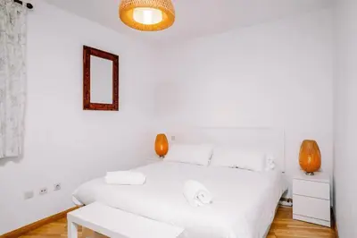 Cama o camas de una habitación en Carlina by Cardi Suites