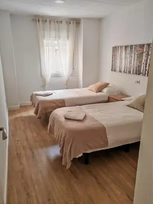 Cama o camas de una habitación en Boutique 2 apartamento Ave centro Lleida
