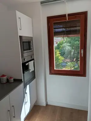Una cocina o zona de cocina en Com a casa