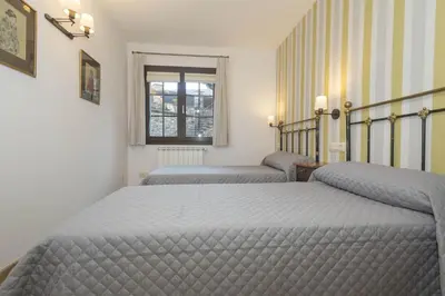 Cama o camas de una habitación en Casa Bringasort
