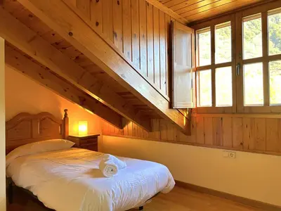 Cama o camas de una habitación en Dúplex familiar i de muntanya a Escaló by RURAL D'ÀNEU