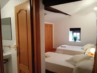 Cama o camas de una habitación en La Posada Nueva
