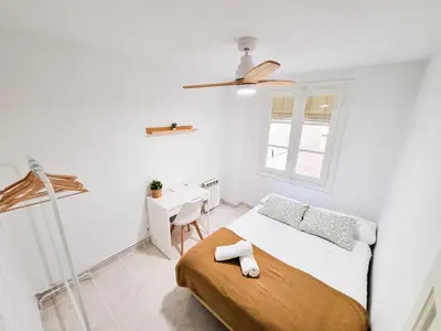 Cama o camas de una habitación en El Tigre del Pilar Turistea