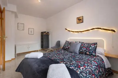 Cama o camas de una habitación en Treparriscos Home l Cine en casa l WIFI l Vistas
