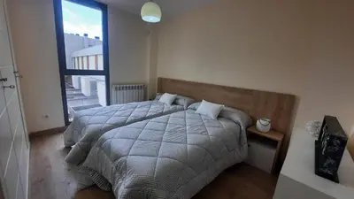 Cama o camas de una habitación en Dúplex Terraza Golf 3 Dormitorios 2 Baños