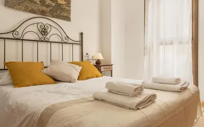 Cama o camas de una habitación en Alojamiento Sebastian II Biescas