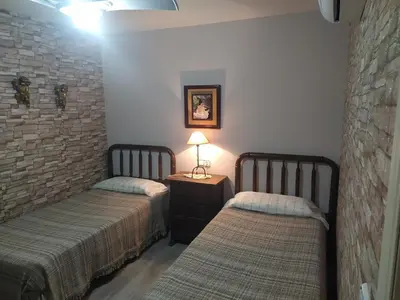 Cama o camas de una habitación en La Palmera de la Insula