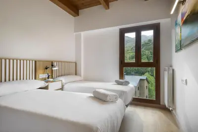 Cama o camas de una habitación en Casa estrellita NOA de CuentoGuía