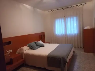 Cama o camas de una habitación en Pis de l'Hereu.