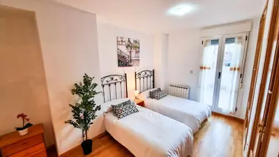 Cama o camas de una habitación en El Alce del Pilar ComoTuCasa