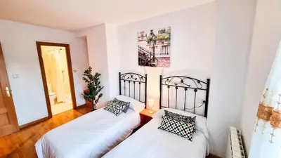 Cama o camas de una habitación en El Alce del Pilar ComoTuCasa