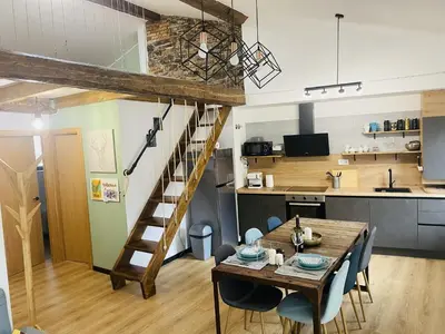 Una cocina o zona de cocina en Ático abuhardillado imak Jaca