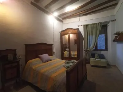 Cama o camas de una habitación en Ca l'Aleixa Rooms