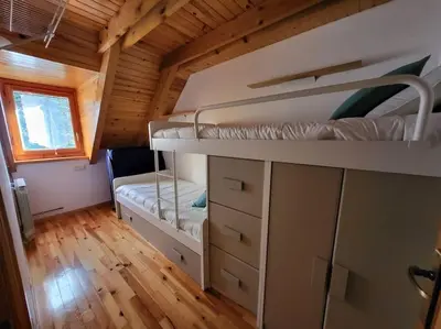 Cama o camas de una habitación en Duplex en la Vall de Boí, plena naturaza