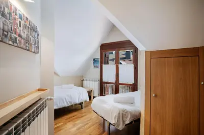 Cama o camas de una habitación en Gaudioso by Cardi Suites