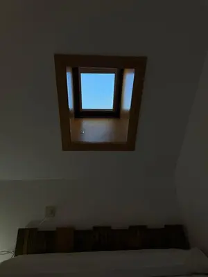 Cama o camas de una habitación en Acogedor Ático en el Corazón de Formigal - Esquía sin llaves