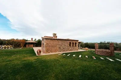 Jardín al aire libre en Casa Hostalets - Renovated casa in the middle of the olive trees near the beach