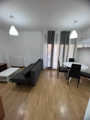 Zona de estar de Apartamento en Sabiñánigo para grupos con amplia y soleada terraza
