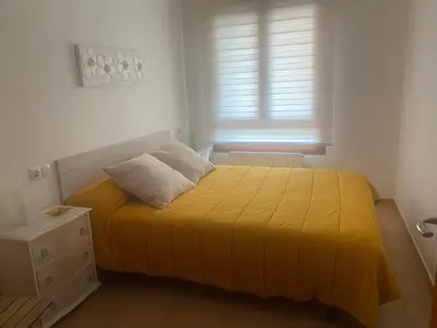 Cama o camas de una habitación en Apto en Campo Valle de Benasque 2 dormitorios Wifi