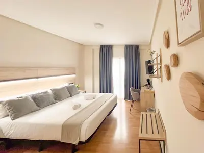 Cama o camas de una habitación en VTZ Hotel El Príncipe
