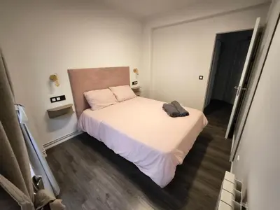 Cama o camas de una habitación en Apartamentos Crispin Anais