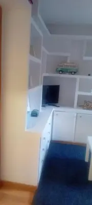 Una televisión o centro de entretenimiento en Apartamento en Formigal