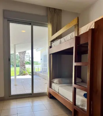 Cama o camas de una habitación en Albergue Zaragoza Camping