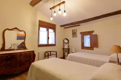 Cama o camas de una habitación en CASA URRA