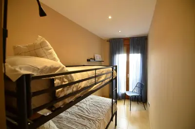 Cama o camas de una habitación en La Caseta del Picatxo