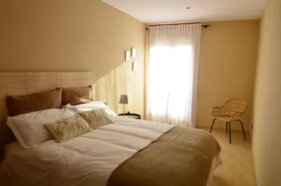 Cama o camas de una habitación en La Caseta del Picatxo