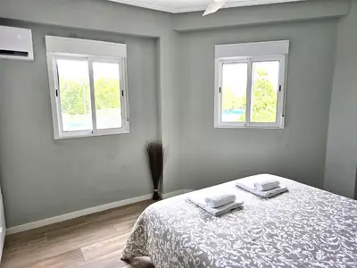 Cama o camas de una habitación en PASARELA ALMOZARA HOME & Parking gratis