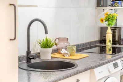 Una cocina o zona de cocina en Espacioso y cómodo apartamento en Pamplona