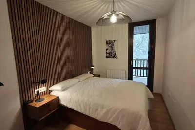 Cama o camas de una habitación en Mimosa 4 con terraza - tucasaenlospirineos