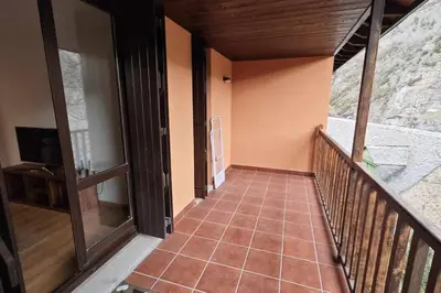 Un balcón o terraza de Mimosa 4 con terraza - tucasaenlospirineos